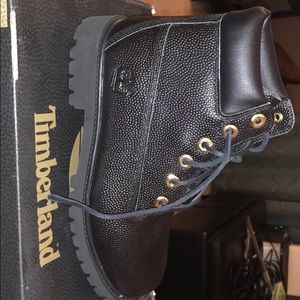 Football textured Timberlands.  NWT.